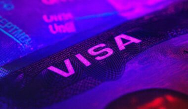 Close-up of a visa page under UV light—hero image for a Cyprus immigration guide covering visas, residence and work permits in 2025.
